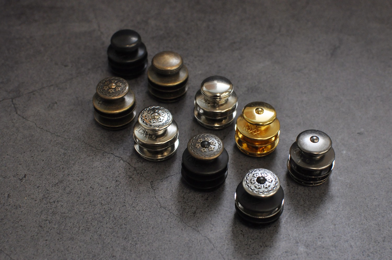 LOXX German quick-release magnetic buttons in several colors and engraved styles